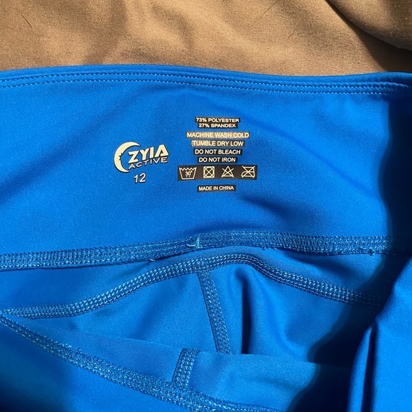 Zyia Active leggings the leopard are size 8-10 the rest are 12 - Picture 7 of 11